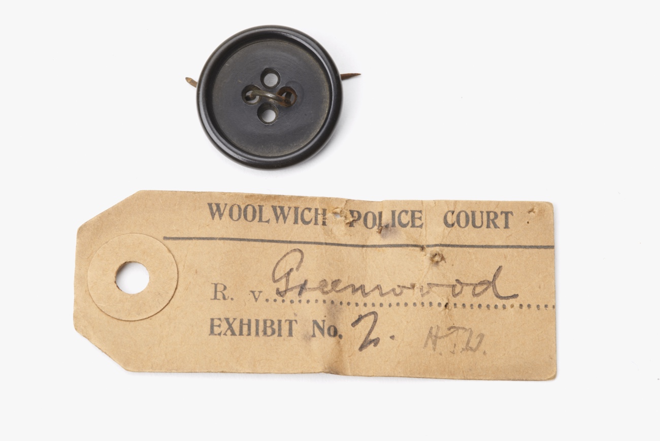 The button that was used to convict David Greenwood of murder, 1918. Greenwood was convicted of raping and murdering 16 year old girl, Nellie Trew. This button was found at the crime scene. He denied having met Nellie but was found guilty and sentenced to death, commuted to life imprisonment instead. He was released in 1933 aged 36. But was he guilty of the crime? © Museum of London / object courtesy the Metropolitan Police’s Crime Museum.
