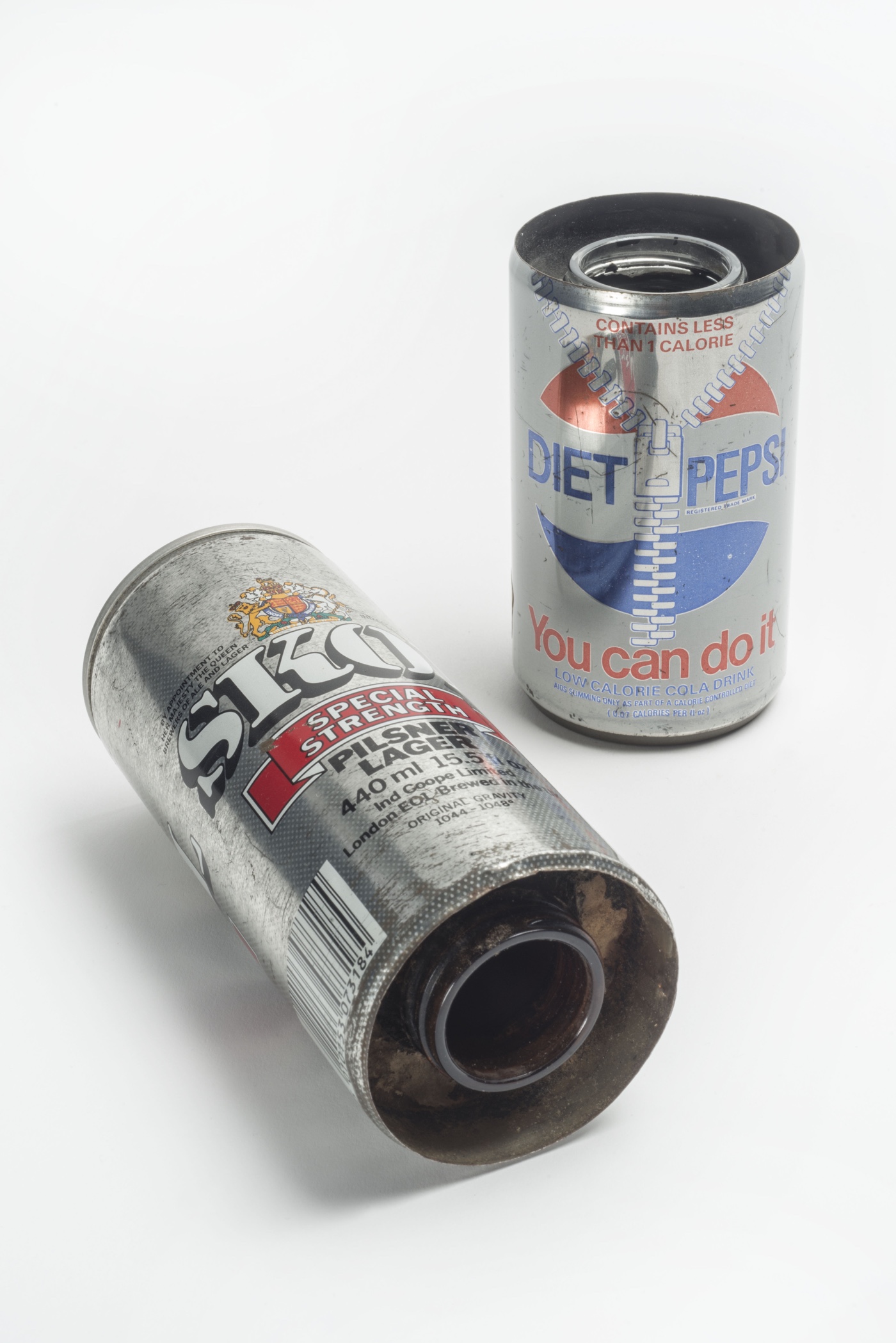 Narcotics: Drinks cans used in drug smuggling, seized by Metropolitan Police © Museum of London