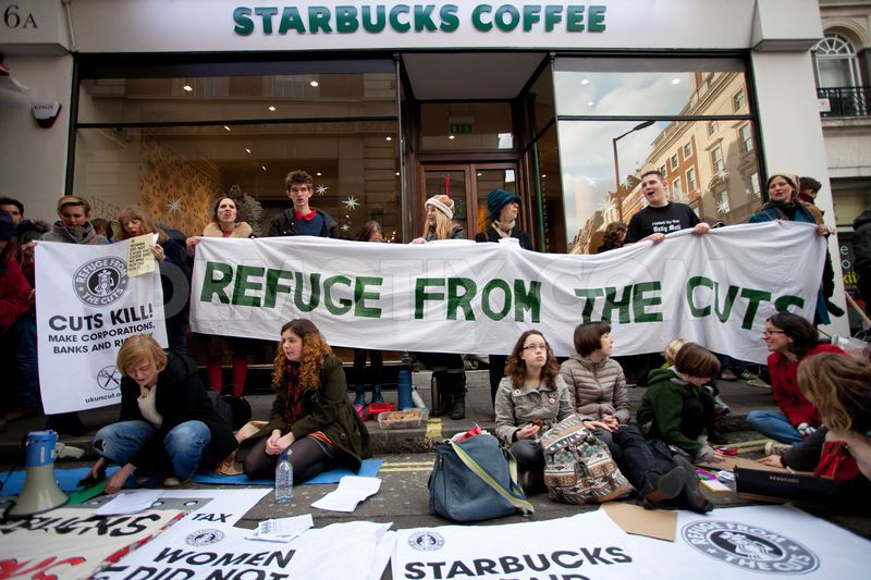 1354999699-starbucks-stores-taken-over-by-uk-uncut-activists_1664912