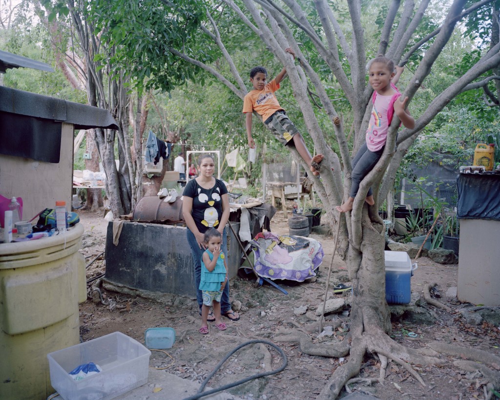 Kandra Powery, 25, and her three children, Kayla, 9, Kaleb, 8, and Janae, 2. The Caymans, a thriving offshore financial center, is the fourth-richest country in the Americas (GDP per capita) but has real pockets of poverty. 55% of the labor force is composed of non-nationals occupying both low-paying jobs in the service sector and high-end jobs in the finance industry. Grand Cayman