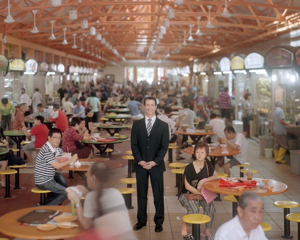 Phil Davis, 46, is Vice President and General Manager of Dell for Asia Pacific and Japan. He has been living in Singapore for over 5 years. According to Bloomberg, Dell has based a substantial part of its operations in Singapore for purposes of tax optimization. Mr. Davis is seen standing in the Maxwell Food Court. Singapore