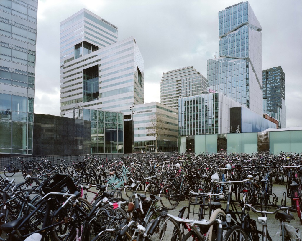Bicycle parking lot in Zuid, a growing financial center on the edge of the city of Amsterdam where thousands of empty mailbox companies used to avoid tax are located.  The Netherlands is one of the biggest enablers of aggressive corporate tax avoidance and has built a booming industry around promoting and selling Dutch tax services to global companies.  According to many specialists, the Netherlands – which has a suite of offerings to cut corporate taxes on, among others, interest, royalties, dividend and capital gains income from foreign subsidiaries,  – is a tax haven. The Netherlands.
